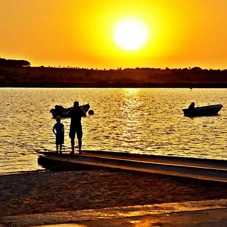 Por-do-sol Алвор